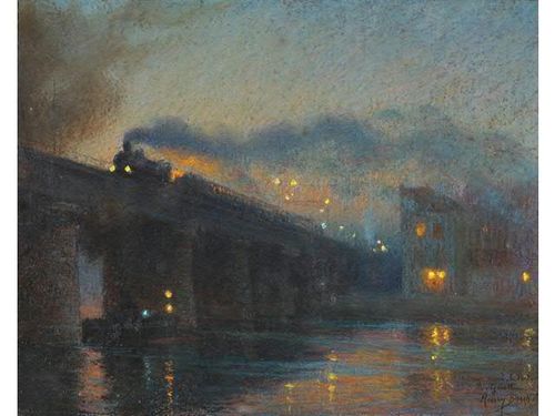 Train dans la nuit sur un pont